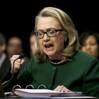 Clinton vows to strengthen US embassy security after Libya attack