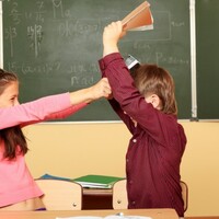 Boys ditch homework and mitch school (but still better at maths than girls)