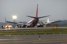 Eight injured as plane lands nose-first in New York