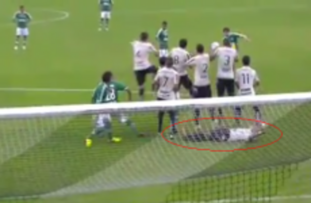 Brazilian Player Tries To Stop Low Free Kick By Lying Down Behind The Wall