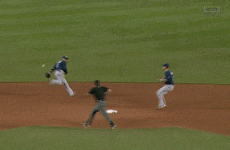Even if you don't like baseball, you'll like this behind-the-back flip pass