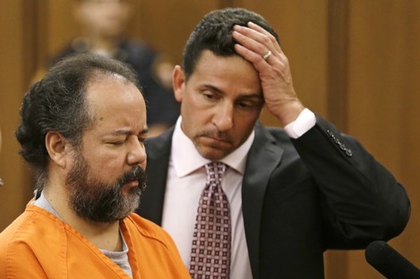 File: Ariel Castro, left, stands before a judge with defence attorney Craig Weintraub during Castro's arraignment
