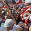 Emotions high as slain Tunisia opposition leader buried
