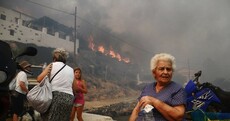 Villages evacuated as wildfires rage on Greek islands