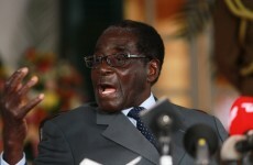 Opposition cries foul as Mugabe claims landslide election victory