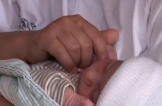 Newborn baby survives crash after car birth