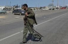 Gaddafi forces "cleanse" oil town of rebel gangs