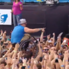 Man crowdsurfs to Irish band... in a wheelchair