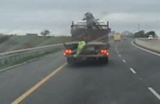 Dancing trousers do a jig on back of moving truck