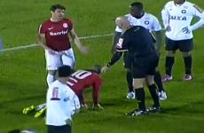 Brazilian referee delivers crunching body-check on unsuspecting player