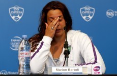 Wimbledon champion Bartoli announces shock retirement at 28