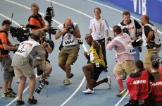 Usain Bolt powers to third world 200m title