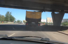 How NOT to carry a giant deer statue under a bridge