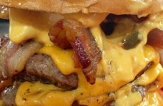 Woman dislocates jaw trying to eat triple-deck burger