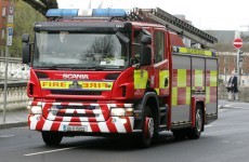 Firefighters tackle blaze at storage factory in Waterford