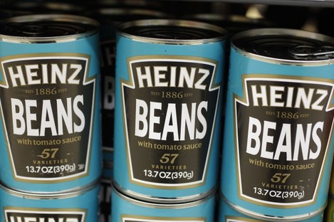 Heinz Beans on the supermarket shelf.