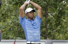 McIlroy back in the groove as 'sore' Woods blames soft hotel bed