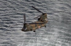 Japanese helicopters dump water on stricken reactor