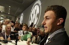 Johnny Football banned for half a game, book closed on autograph controversy