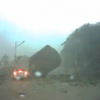 Giant boulder almost crushes car in dashcam video