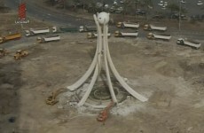 In photos: Bahrain's Pearl Square monument pulled down