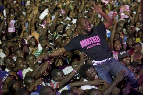 Wyclef Jean performing at a campaign rally for Haitian presidential candidate Michel Martelly on 11 March.