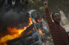 Coalition forces destroy building in Gaddafi compound
