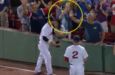 Excited Red Sox fan knocks beer into woman's face after amazing catch