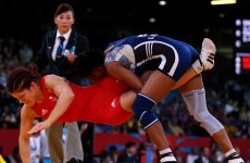 Wrestling wins reprieve for 2020 Olympics