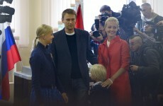 Putin ally wins tight Moscow poll, his opponent vows to protest