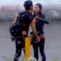 Man tries to keep his girlfriend nice and dry... fails horribly