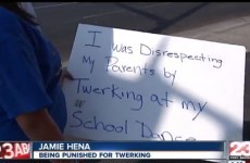 Daughter forced to publicly hold sign as punishment for twerking