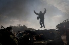 Under-fire Gaddafi: "We will be victorious in the end"