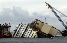 Storm delays huge operation to raise Costa Concordia