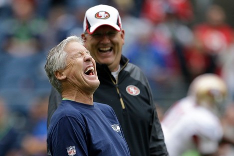 Seattle head coach Pete Carroll (foreground) had the last laugh over the 49ers last night. 