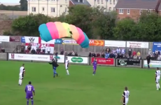 Take a parachute: Match stopped by pitch invader with a difference