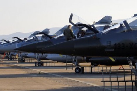 French Mirage 2000 jet fighters are prepared for a mission to Libya, at Solenzara 126 Air Base, Corsica island, Mediterranean Sea, Wednesday, March 23, 2011.