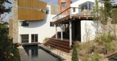If we're out of recession, should we rent Eddie Irvine's old pad?