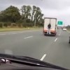 WATCH: Man hitches a ride down the M7 on the back of a truck