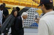 Mila Kunis &amp; Ashton Kutcher photobomb Steelers owner Dan Rooney