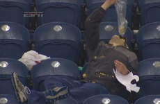 Drunk American football fan drowns his sorrows in popcorn