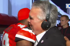 Entire American football team hugs sports anchor whose daughter recently died