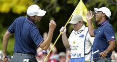 Tiger and Kuuuuuch are celebrating their birdies with a 'Fresh Prince' handshake
