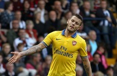 Wilshere lights Arsenal's path to summit