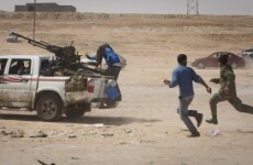 Rebel advance on Gaddafi's hometown checked by pro-government forces