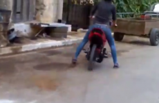 Girl attempts to ride motorbike, fails spectacularly