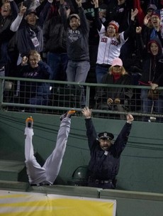 A perfectly-timed photo of a Boston cop celebrating David Ortiz's home run