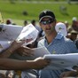 Late eagle lifts Scott to Grand Slam of Golf victory, Harrington finishes last