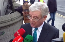 Tánaiste and Howlin insist: James Reilly is doing a very good job