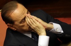 Berlusconi is fighting HOW many court cases?